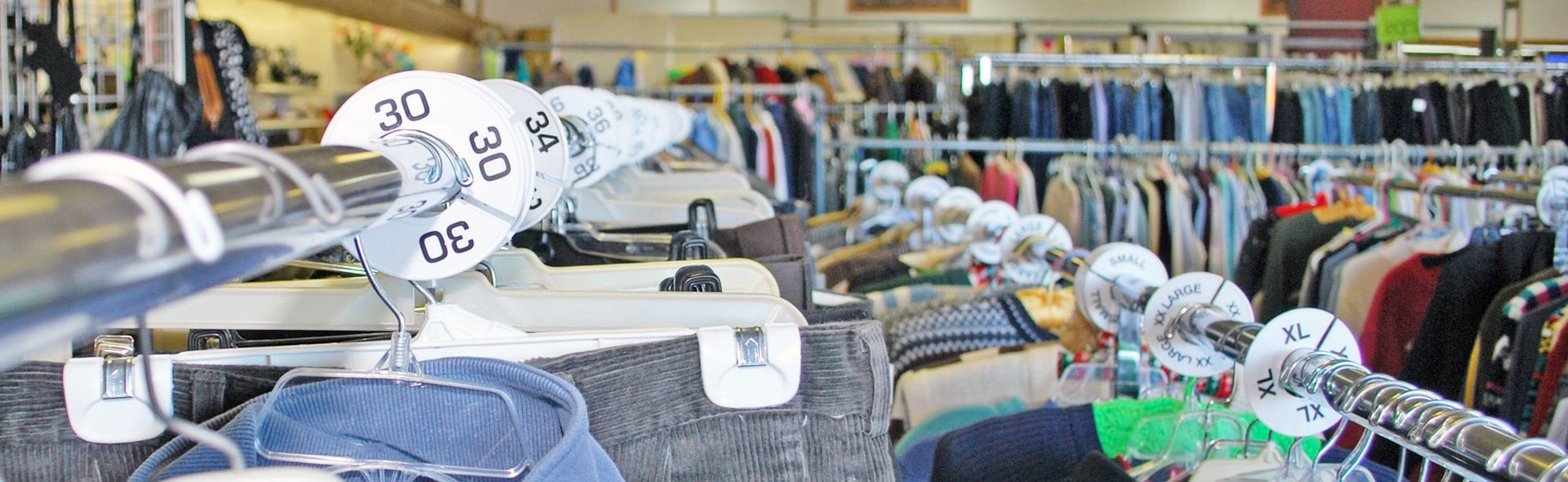 Racks of many, many clothes in the Bargain Garden