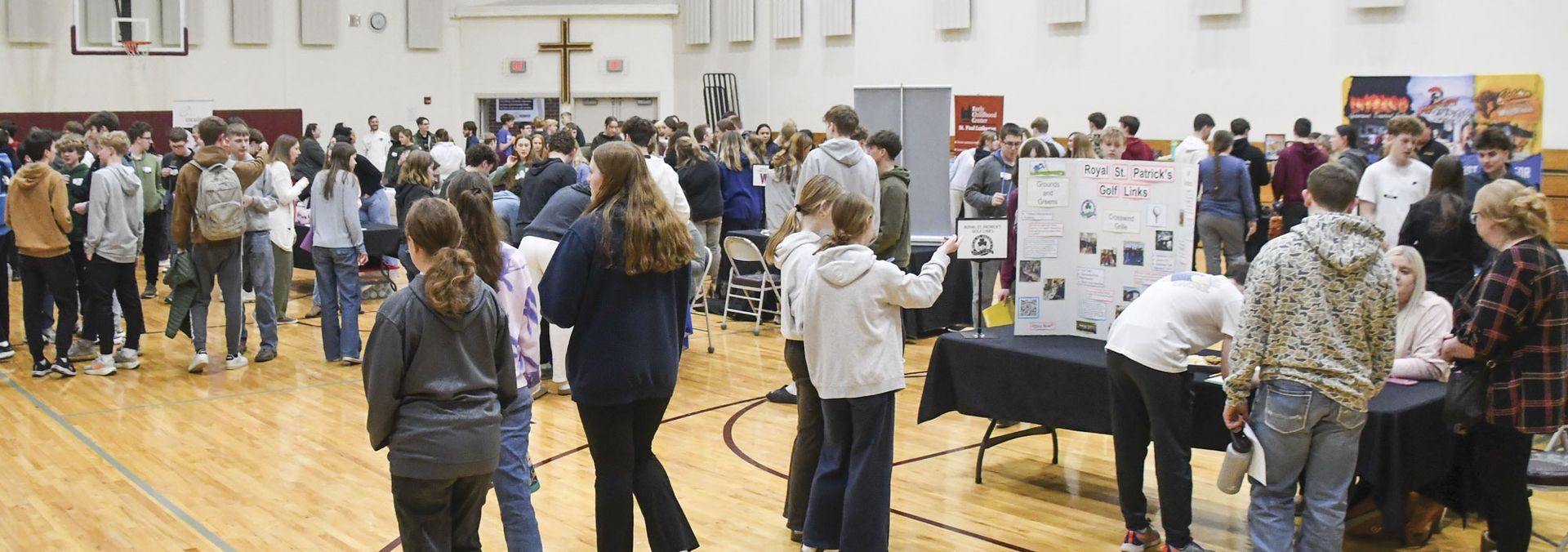 Gym filled with businesses and high school students