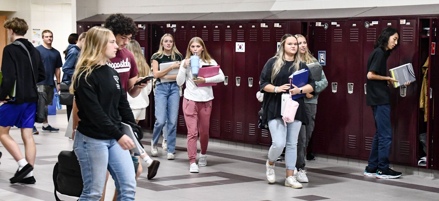 Students using and walking by some of the newly installed lockers