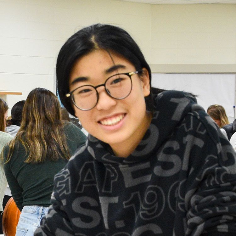 Smiling international student looking at the camera