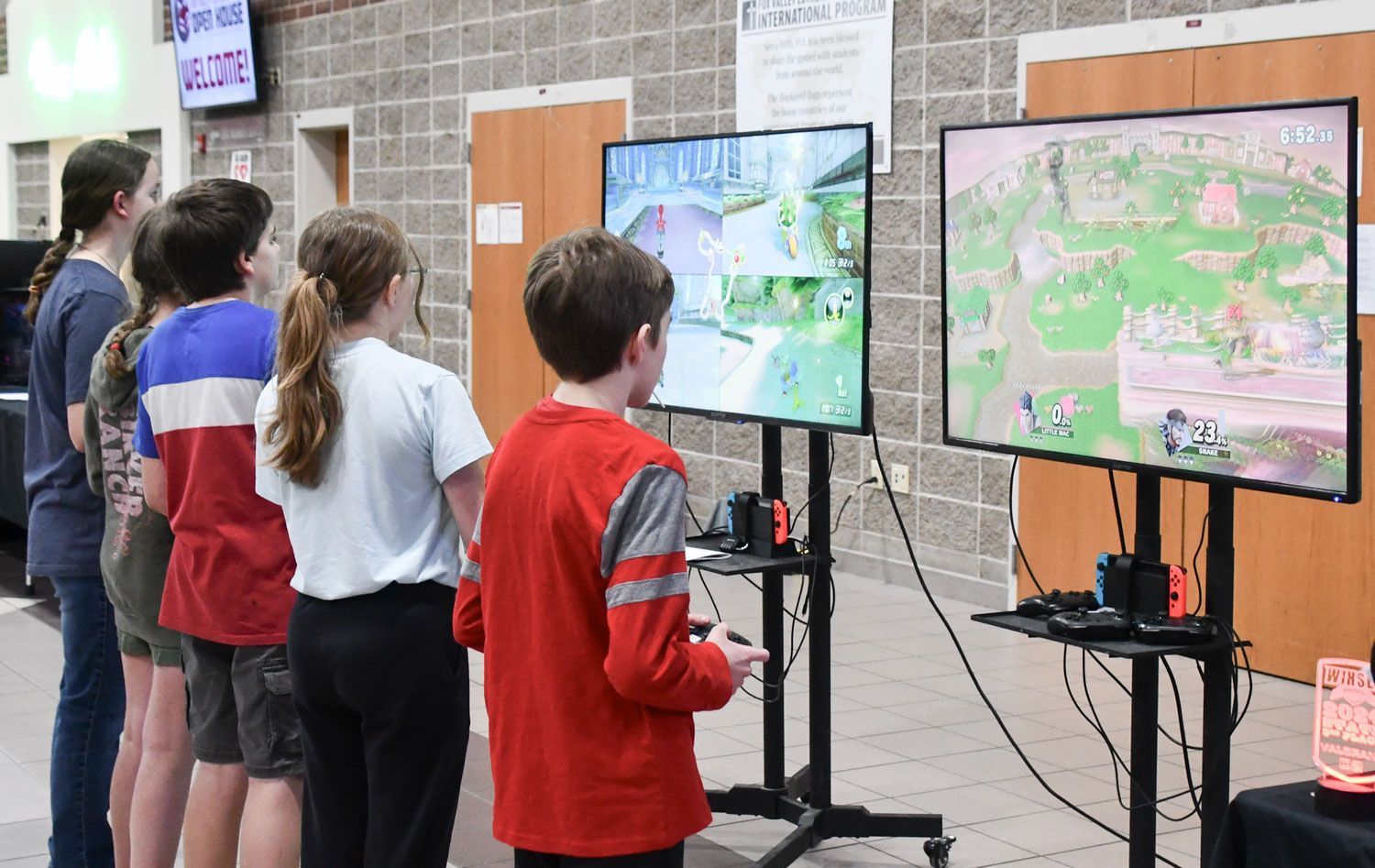 Visiting students playing video games