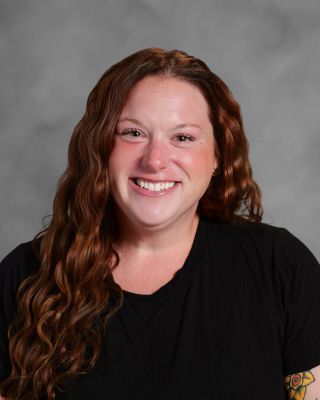 Smiling headshot of Amy Balza