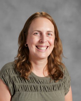 Smiling headshot of Adirenne Bengel