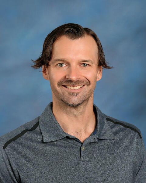 Smiling headshot of Charles Flunker