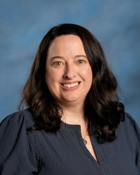 Smiling headshot of Julie Sieg