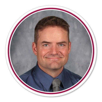 School head shot of smiling Brad Krause