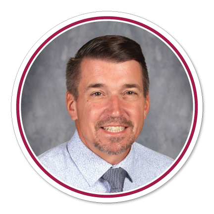 School head shot of smiling Erich Schaser