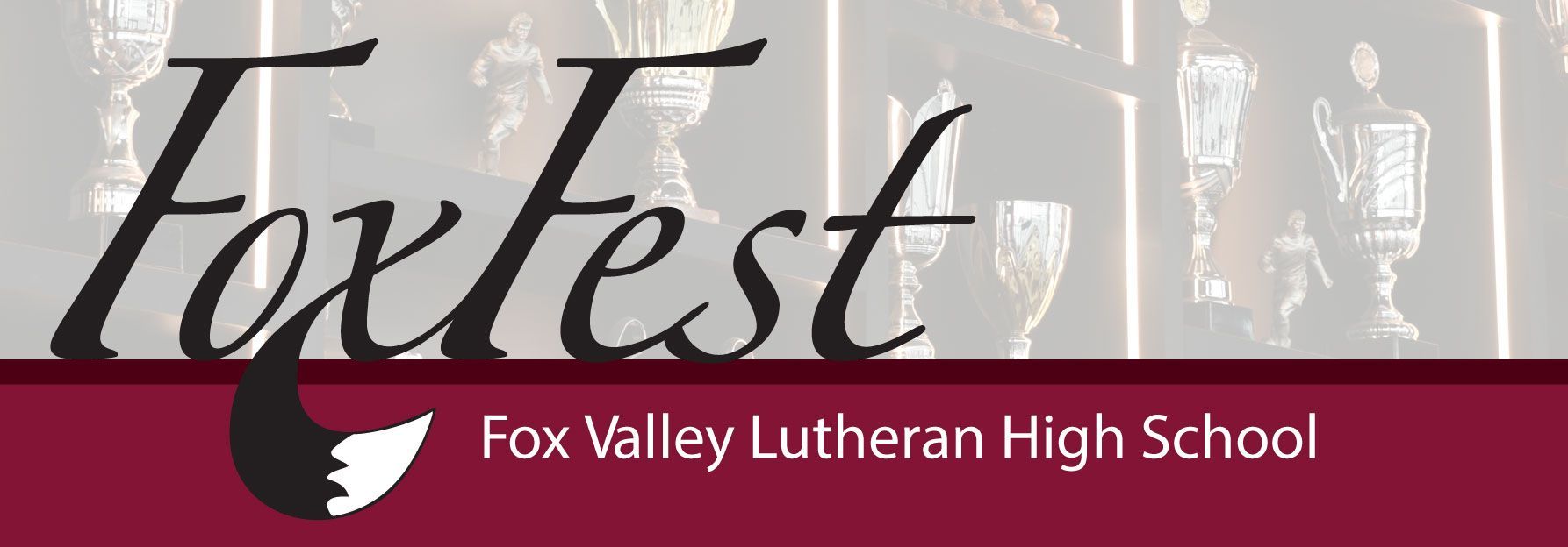 FoxFest logo on a transparent image of a lot of trophies on shelves.