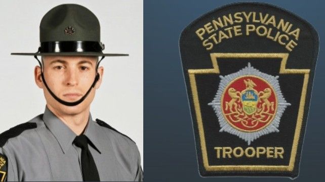 Pennsylvania State Police trooper portrait with uniform and badge patch