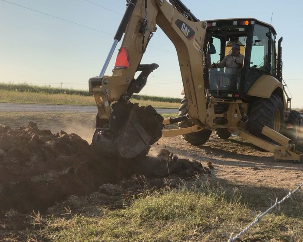 Tractor Digging Soil — Harlingen, TX — Abundiz Tractor Services