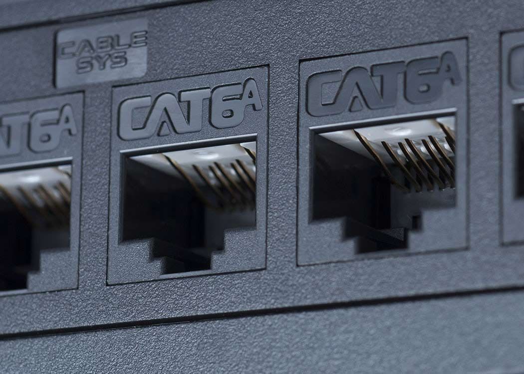 Reliable Cat 6 & Cat 6a cabling for fast, secure connections Four Ethernet ports labeled Cat6a for structured network connectivity