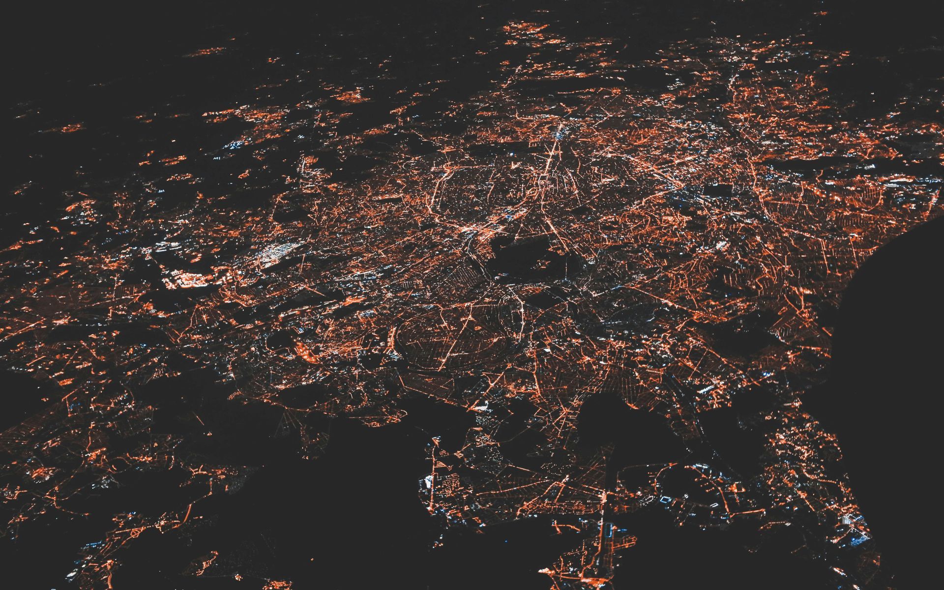 Reliable SD-WAN support for modern business networking Nighttime cityscape symbolizing interconnected digital infrastructure