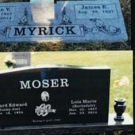 Two headstones in a cemetery: a grey granite marker for Myrick and a black granite marker for Moser.