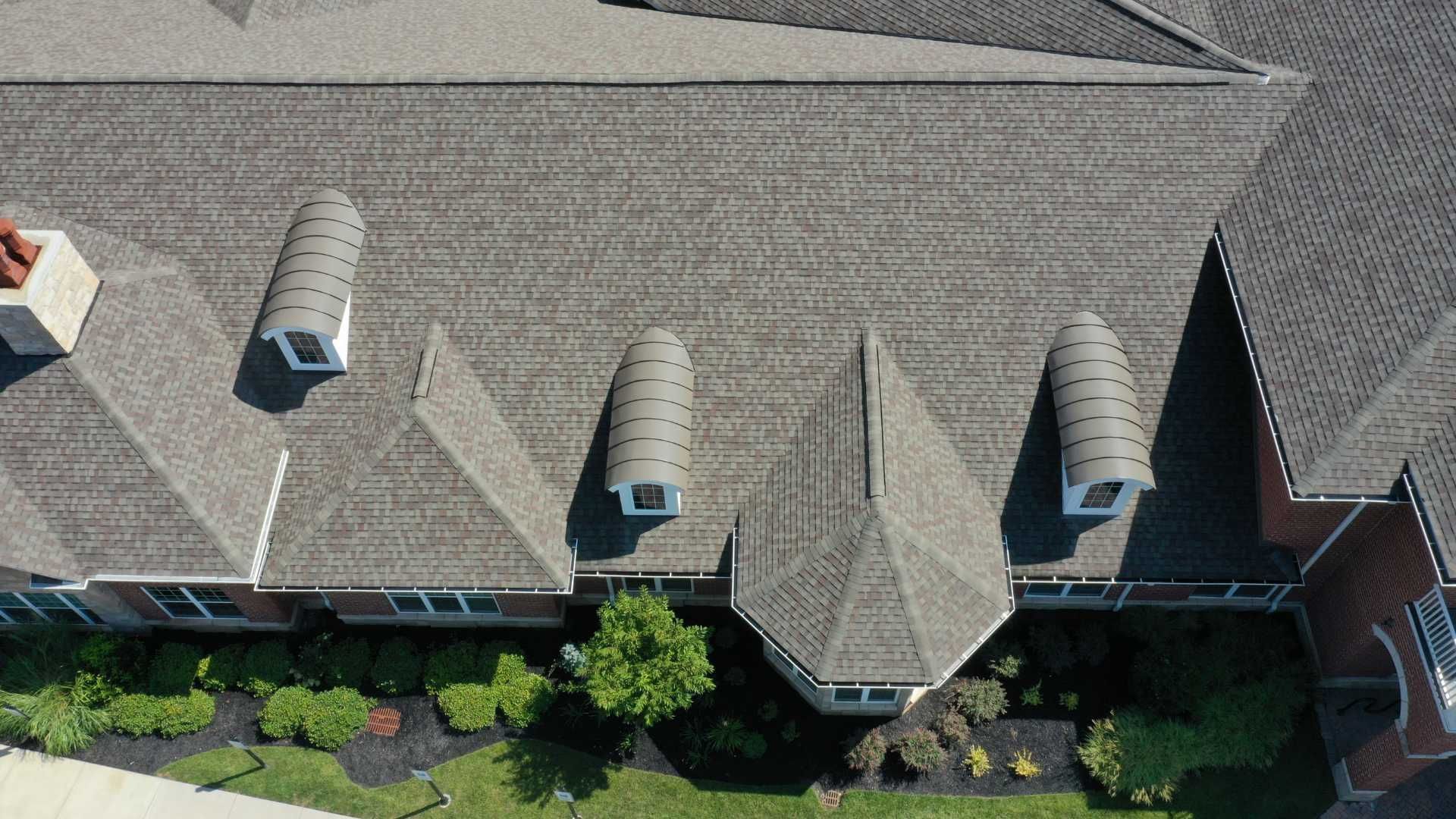 A white roof with a few tools on it