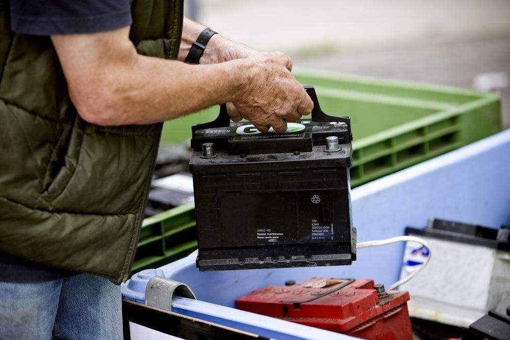 Black Car Battery — Automotive Batteries in Boonah, QLD