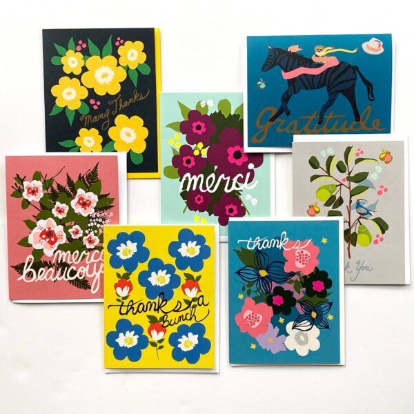 Collection of colorful floral greeting cards with various sentiments.
