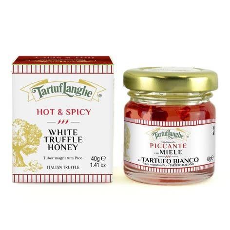 Jar of white truffle honey, with a box of truffle honey, labeled 