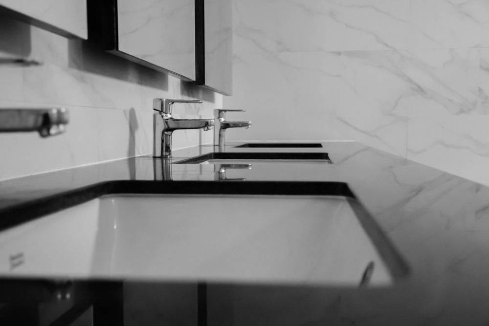 A Row of Sinks with Chrome Faucets in A Bathroom — Stone Effects In Forest Glen, QLD