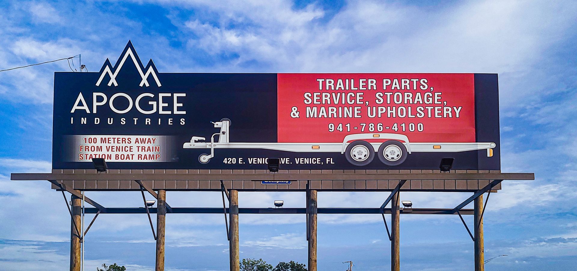 A billboard for apogee trailer parts service storage marine upholstery