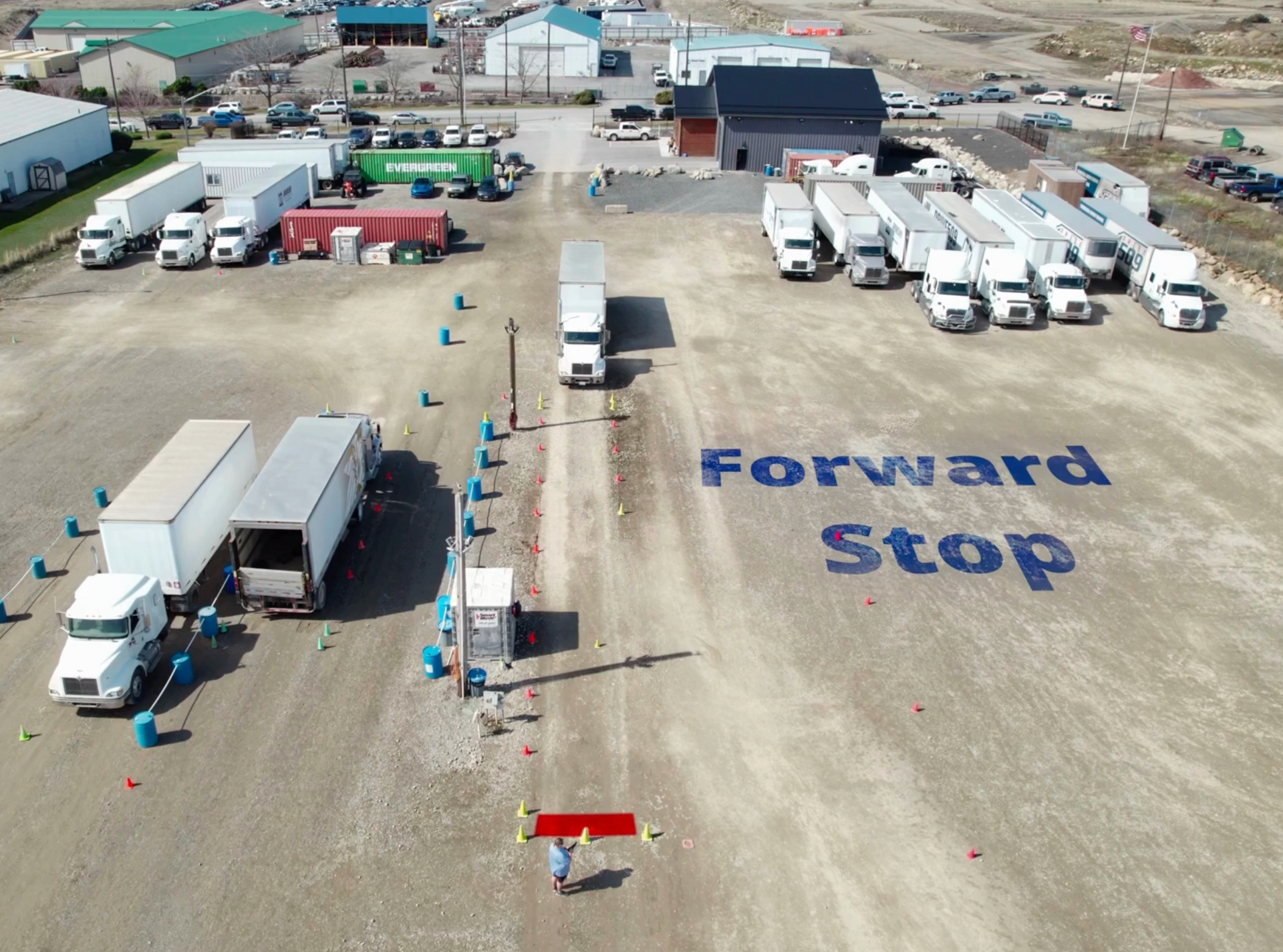 two semi trucks on a cdl training yard