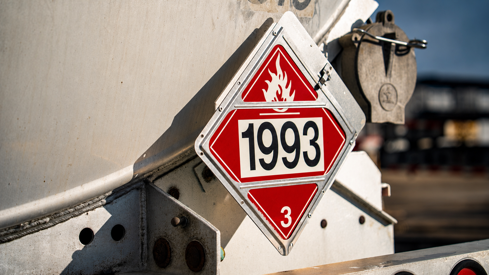 Hazard placard with red diamond flammable symbol and number 1993 on industrial equipment