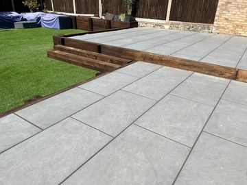 Grey porcelain paving slab patio installation completed in the Luton area