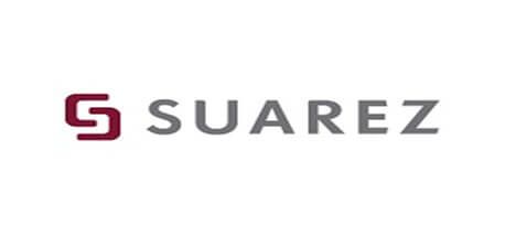 The Suarez brand logo featuring a stylized burgundy letter