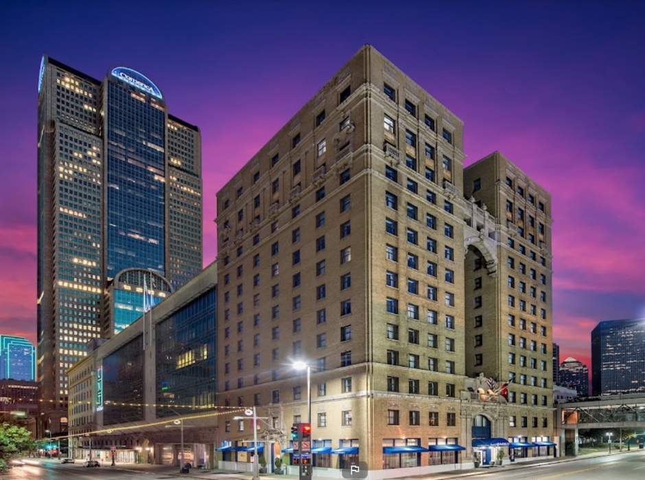Man sitting at desk with laptop 