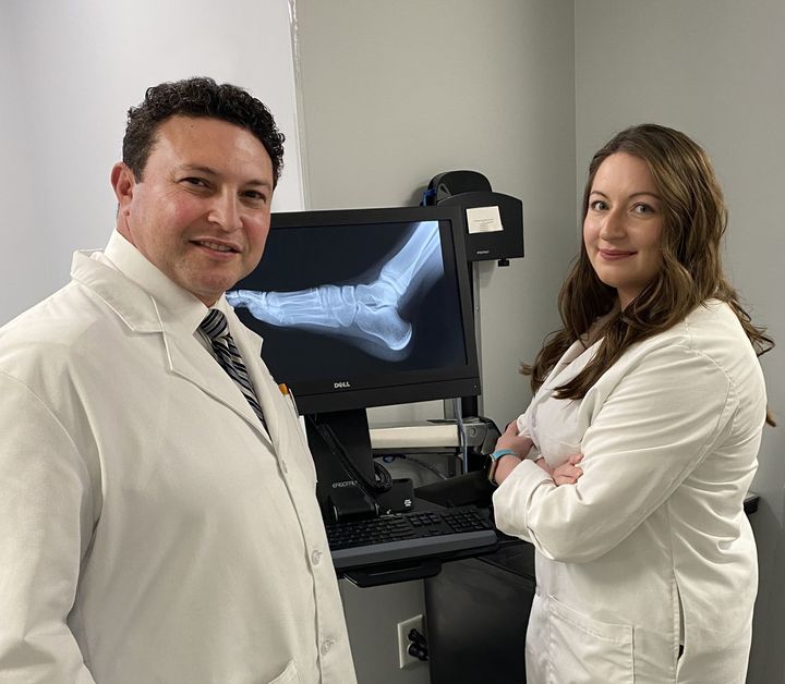 Hand Of Doctor Holding Patient's Leg - St. Peters, MO - Feet First Podiatry
