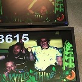 Two screens displaying roller coaster ride photos. The bottom screen shows people smiling on the ride, with the score 3615.