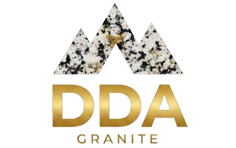 DDA Granite logo with three speckled granite peaks above gold &ldquo;DDA&rdquo; text and &ldquo;GRANITE&rdquo; below
