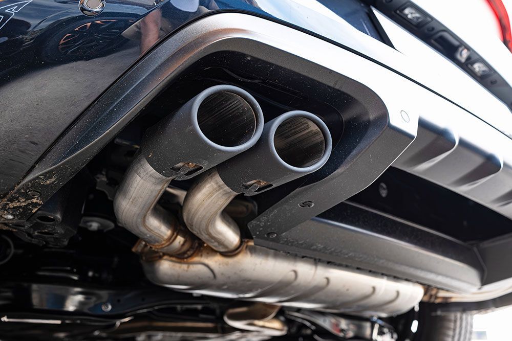 Twin tip car exhaust pipe tip and muffler