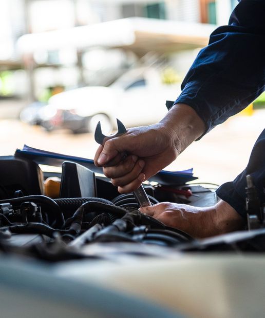 mechanic repairing car auto