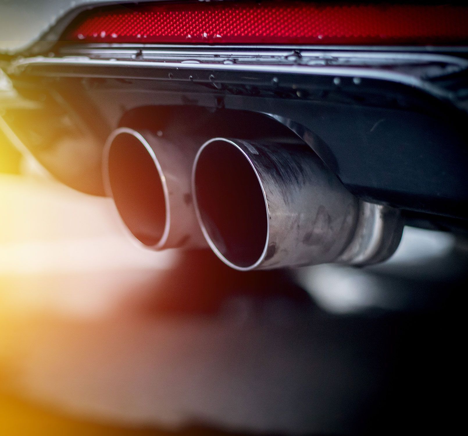 car with exhaust pipe