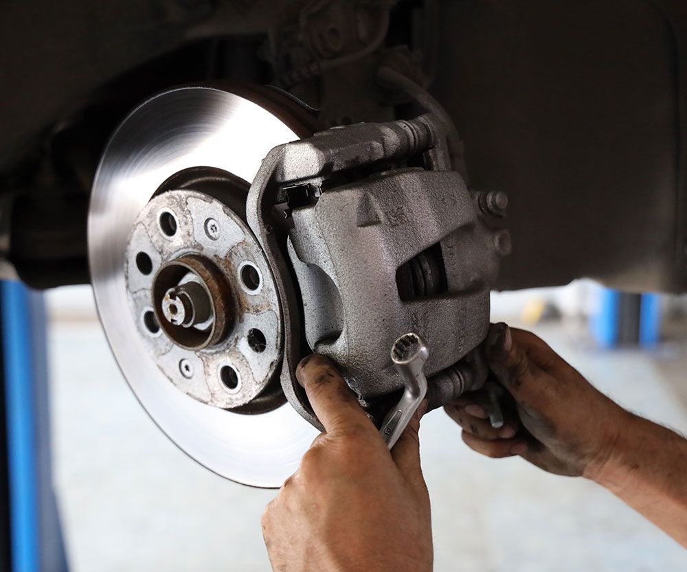 Brake pad replacement in car service