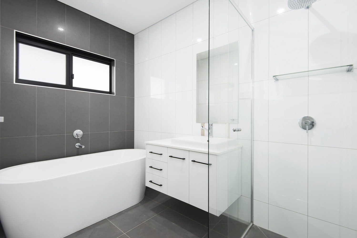 A Bathroom With a Bathtub, Sink, and Shower — Top End Joinery In Yarrawonga, NT