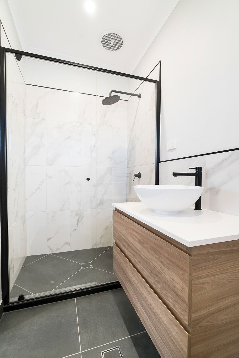 A Bathroom With a Sink and a Walk in Shower — Top End Joinery In Yarrawonga, NT
