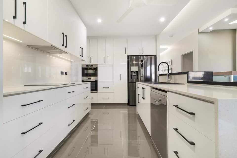 A Kitchen With White Cabinets and Black Handles — Top End Joinery In Yarrawonga, NT