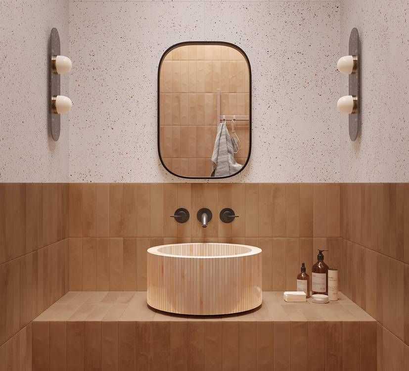 Un bagno con un lavandino in legno e uno specchio.
