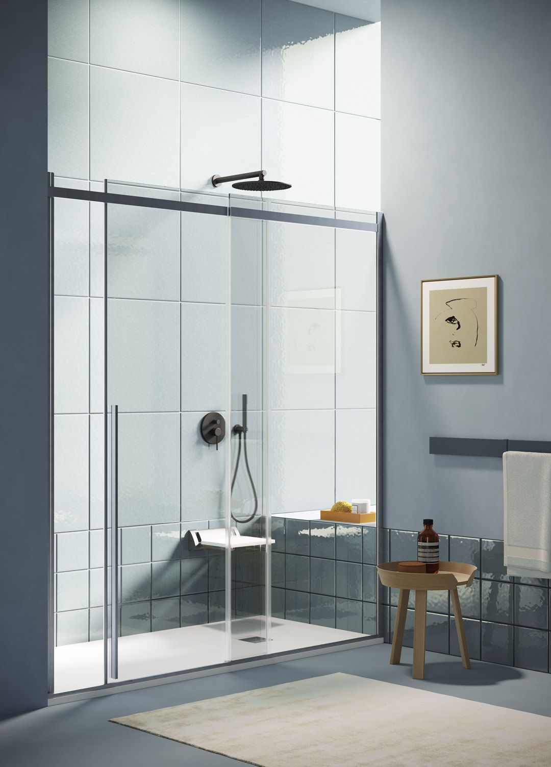 Un bagno con una porta scorrevole in vetro per la doccia e un tavolo in legno.