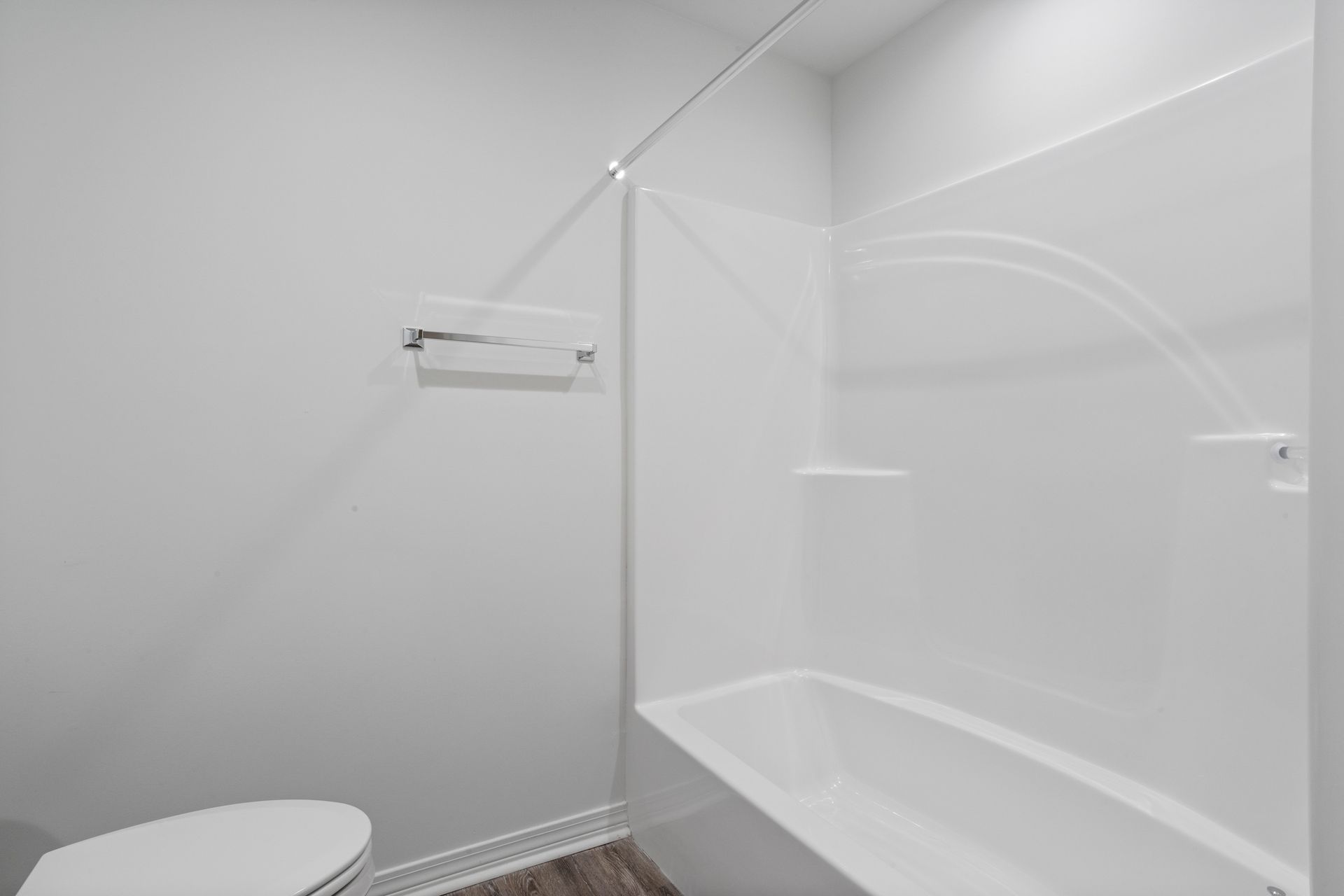 Photo of a bathroom with a shower/bathtub combo