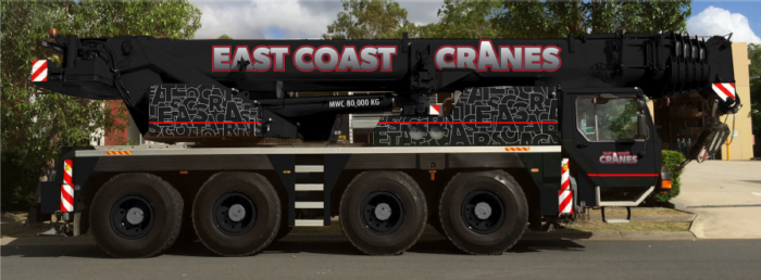 A Large Black Crane Parked on the Side of the Road — East Coast Cranes in Ormeau, QLD