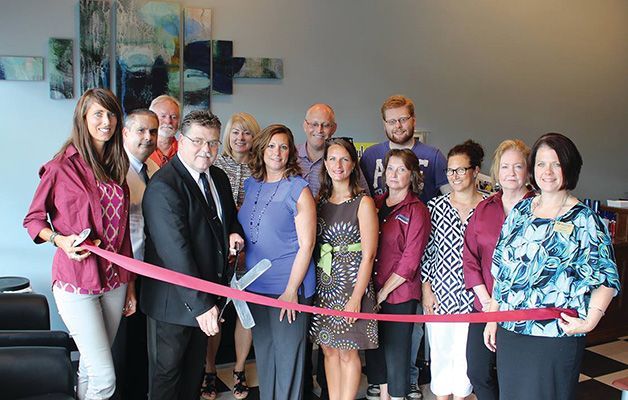 Group Of People Cutting A Ribbon | Onalaska, WI | Denture Smart Denture Service Group Of People Cutting A Ribbon | Onalaska, WI | Denture Smart Denture Service