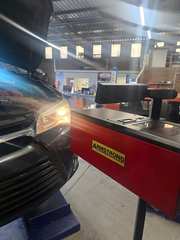 The Inside Of A White Car With The Dashboard Removed — Nuron Inspection & Service Centre In Broadmeadow, NSW