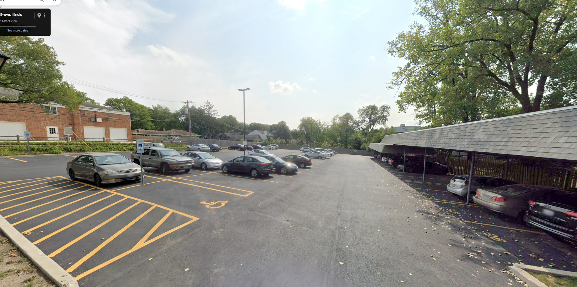 a parking lot with a lot of cars parked in it