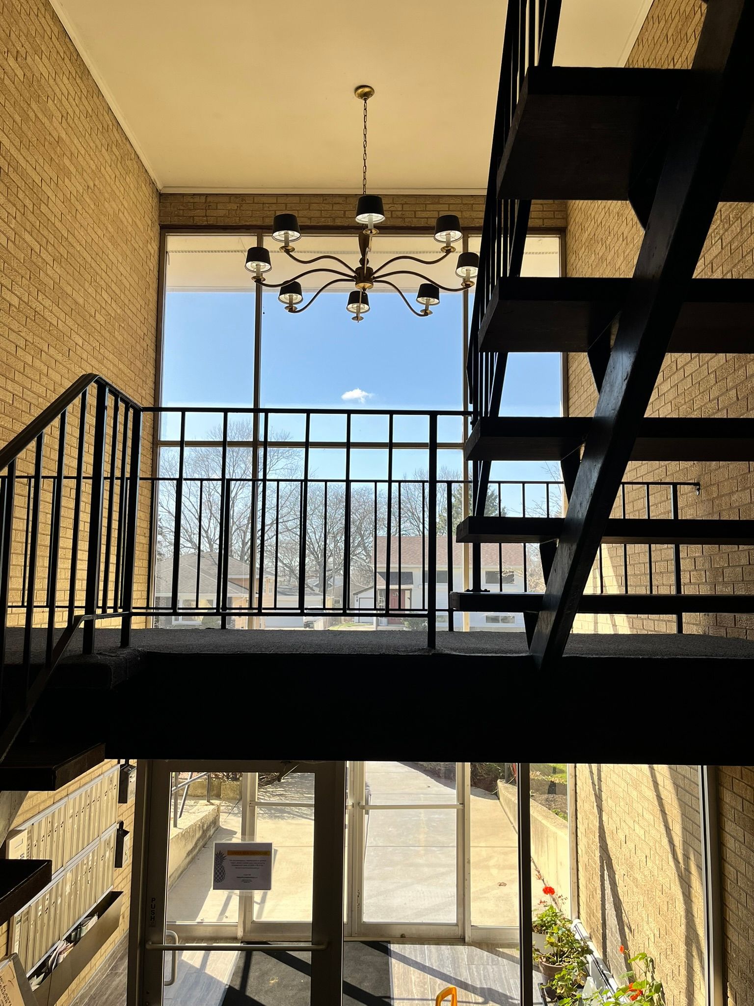 a view of a staircase from the second floor of a building .