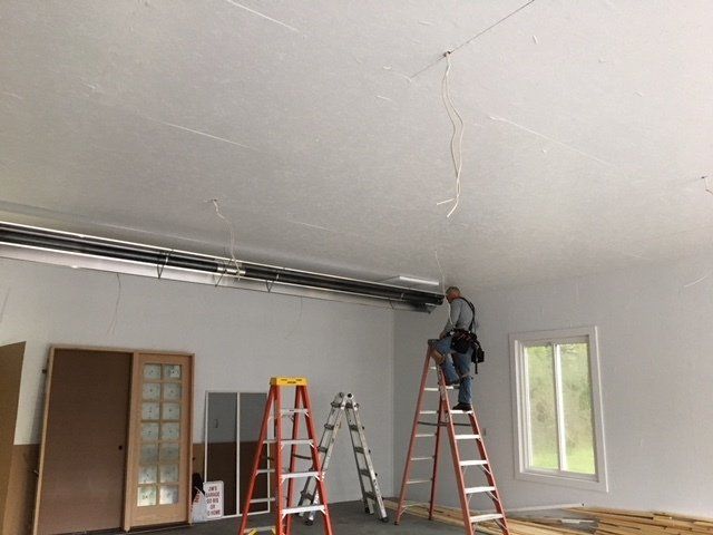 Professional Worker Installing Air Duct — Oregon, WI — Brothers HVAC LLC