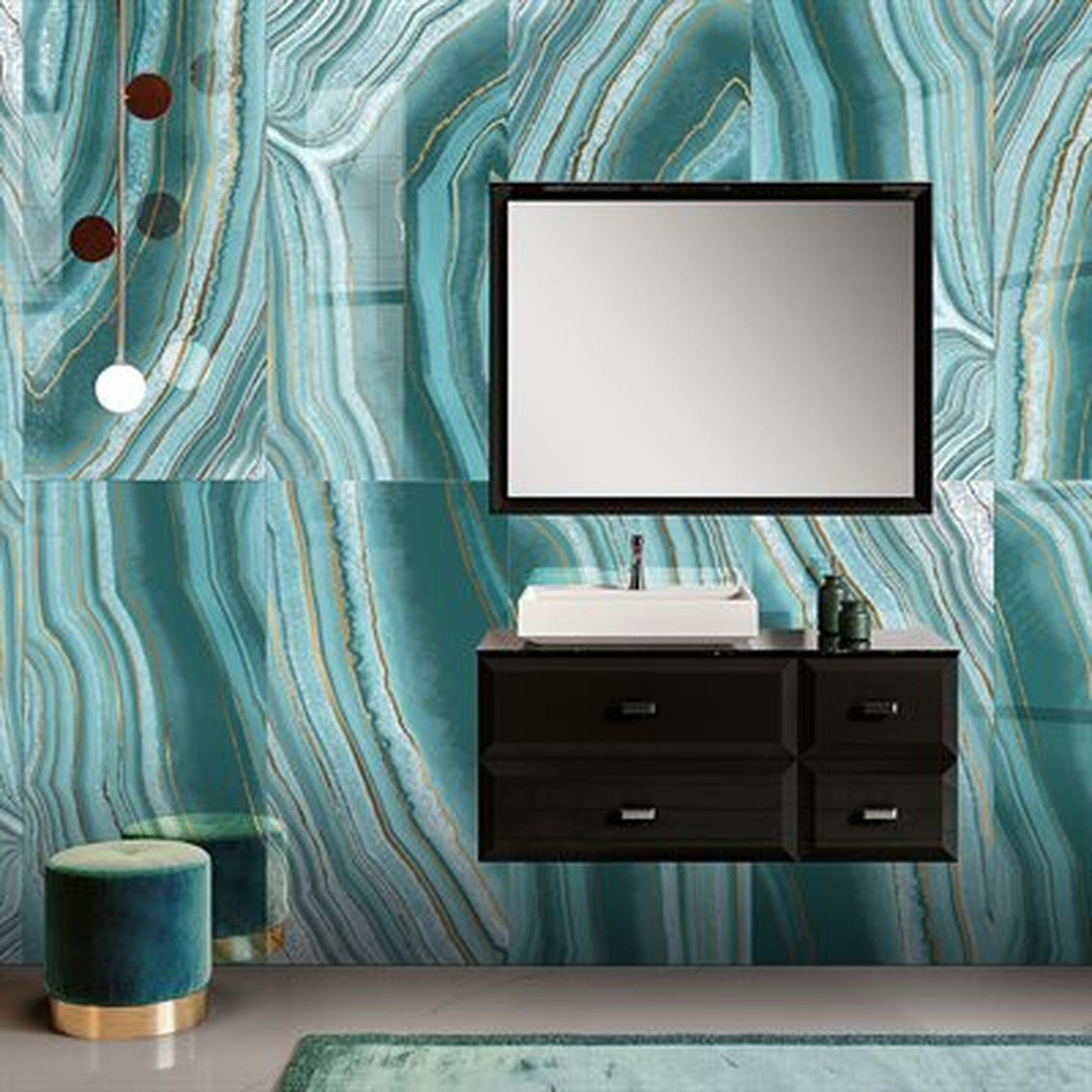 Bathroom with teal agate-patterned wall, black vanity, white sink, mirror, and stool.