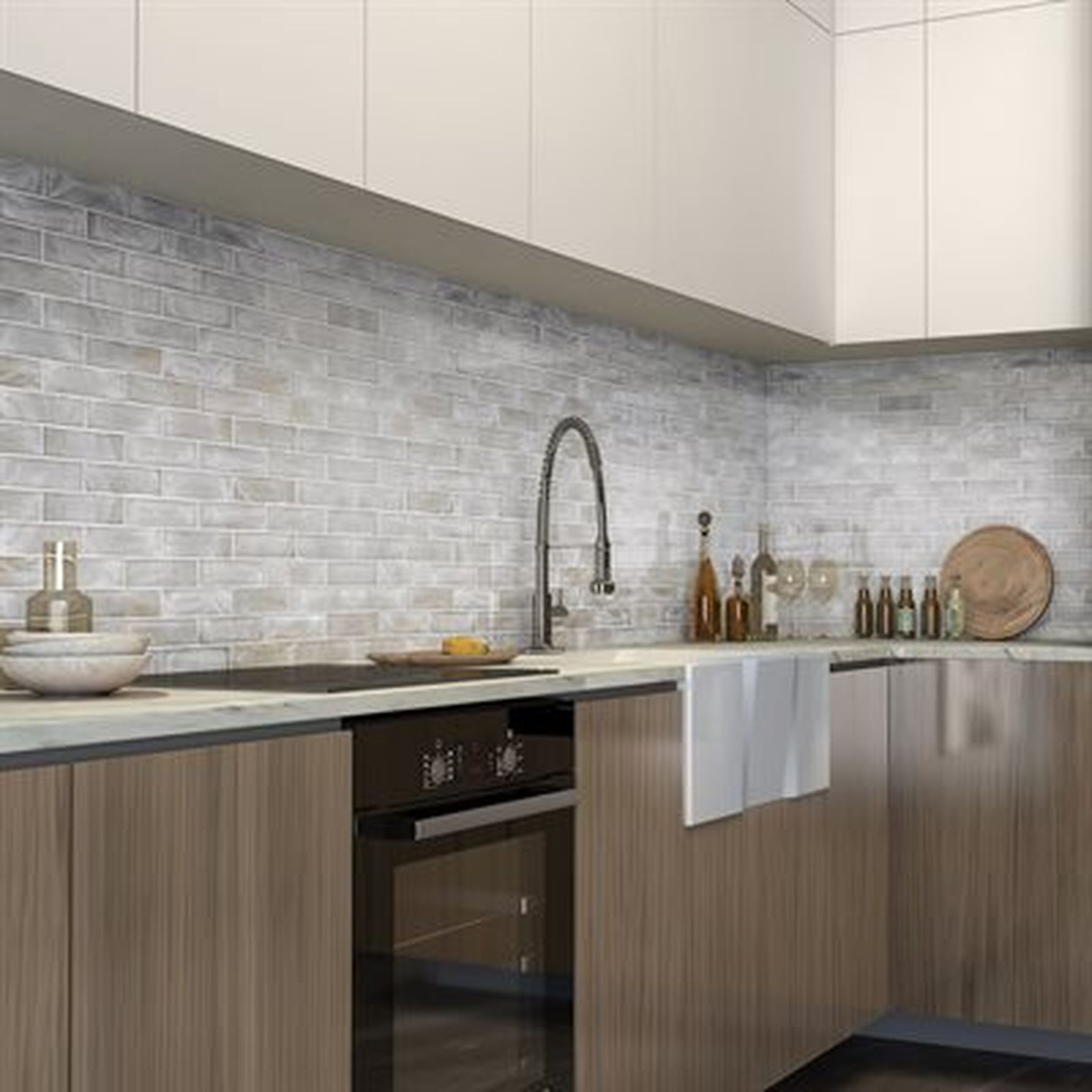 Modern kitchen with light brick backsplash, dark oven, and wooden cabinets.