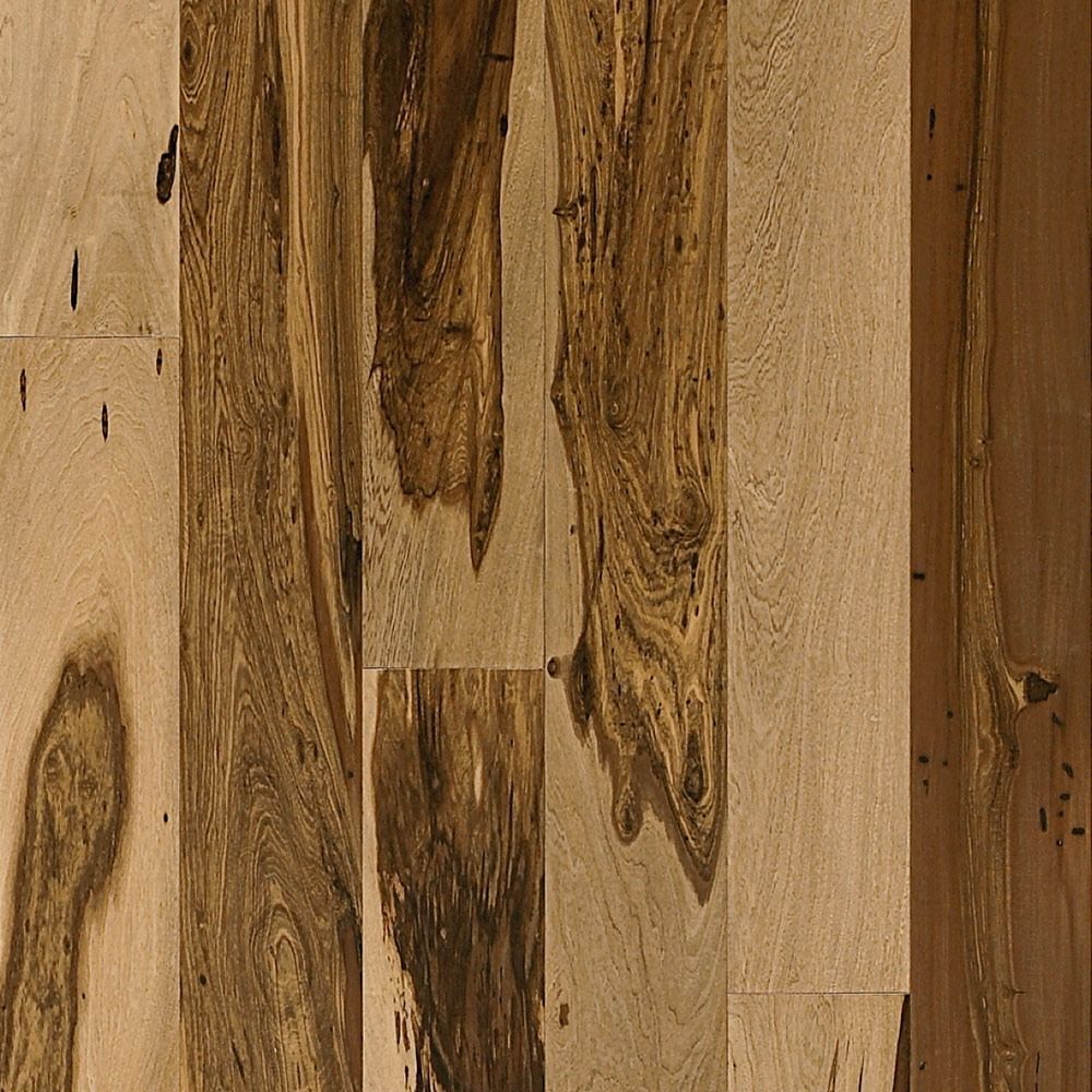 Wood flooring with varying shades of brown and natural wood grain patterns.